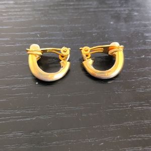 Gold tone half hoop clip-on earrings